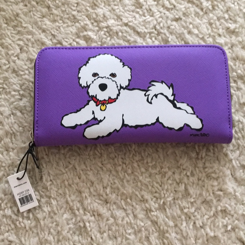 Purple wallet with white dog